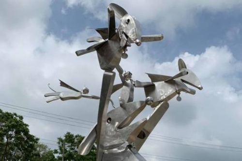 "Do Something Good With Your SuperPowers" sculpture by James Douglas-Cox with stainless steel